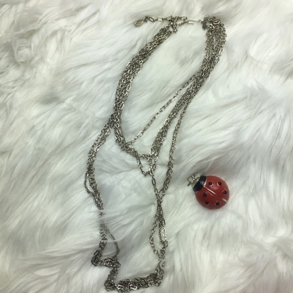 Multi-strand, graduated silver tone necklace, NWOT